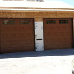 Photo of a 2 wood residential garage doors