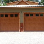 Photo of 2 wood residential garage doors